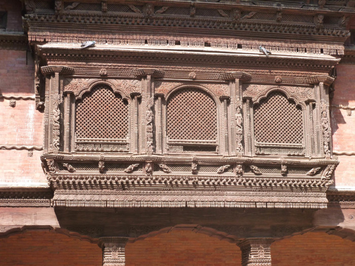 Intricate woodwork on a building in Kathmandu Durbar Square