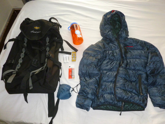 The purchased backpack, down jacket, and other items