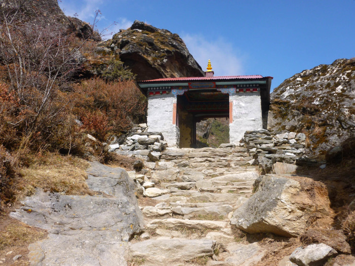 A stone archway at the entrance to one of the villages