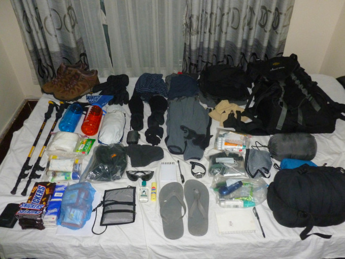 All of the gear laid out on the bed
