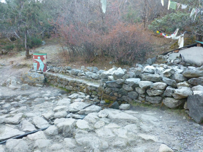 Water coming out of a pipe. This kind of thing was often how I got water.