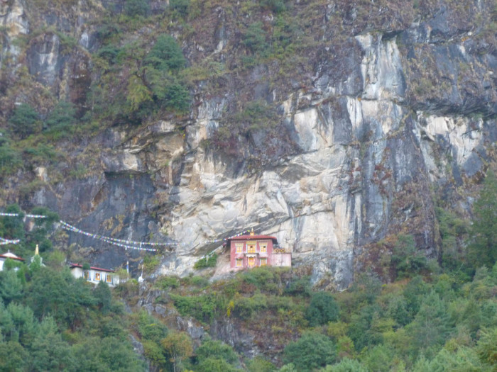 A small temple built into a cliff face