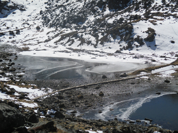 Looking down into the icy corner of Gosainkund.