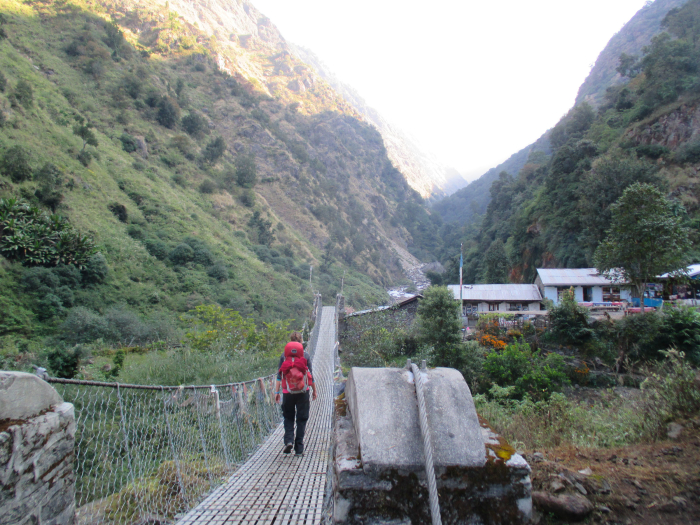 Crossing a bridge over a smaller side stream.