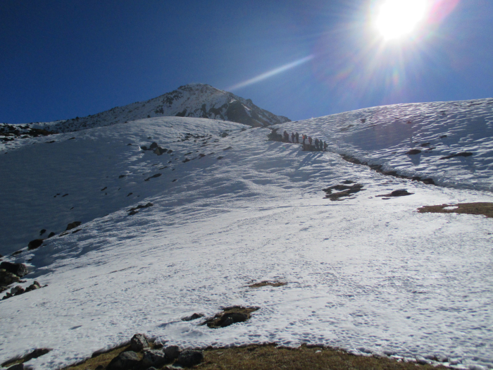 A line of hikers heading up Tserko Ri.