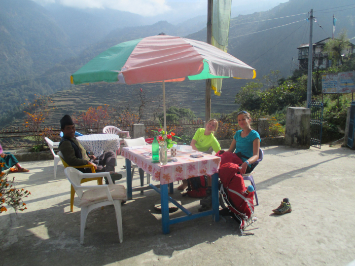 Enjoying our extended lunch break in Thulo Syaphru.